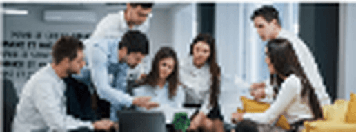ZYBO team brainstorming over laptop